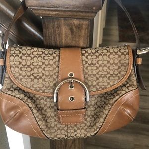 Coach. Smaller bag. Brown